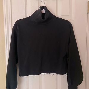 Black cropped turtleneck sweater